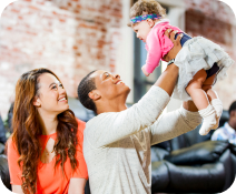 Family playing with baby